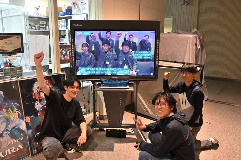 Members celebrating the BOTAN deployment